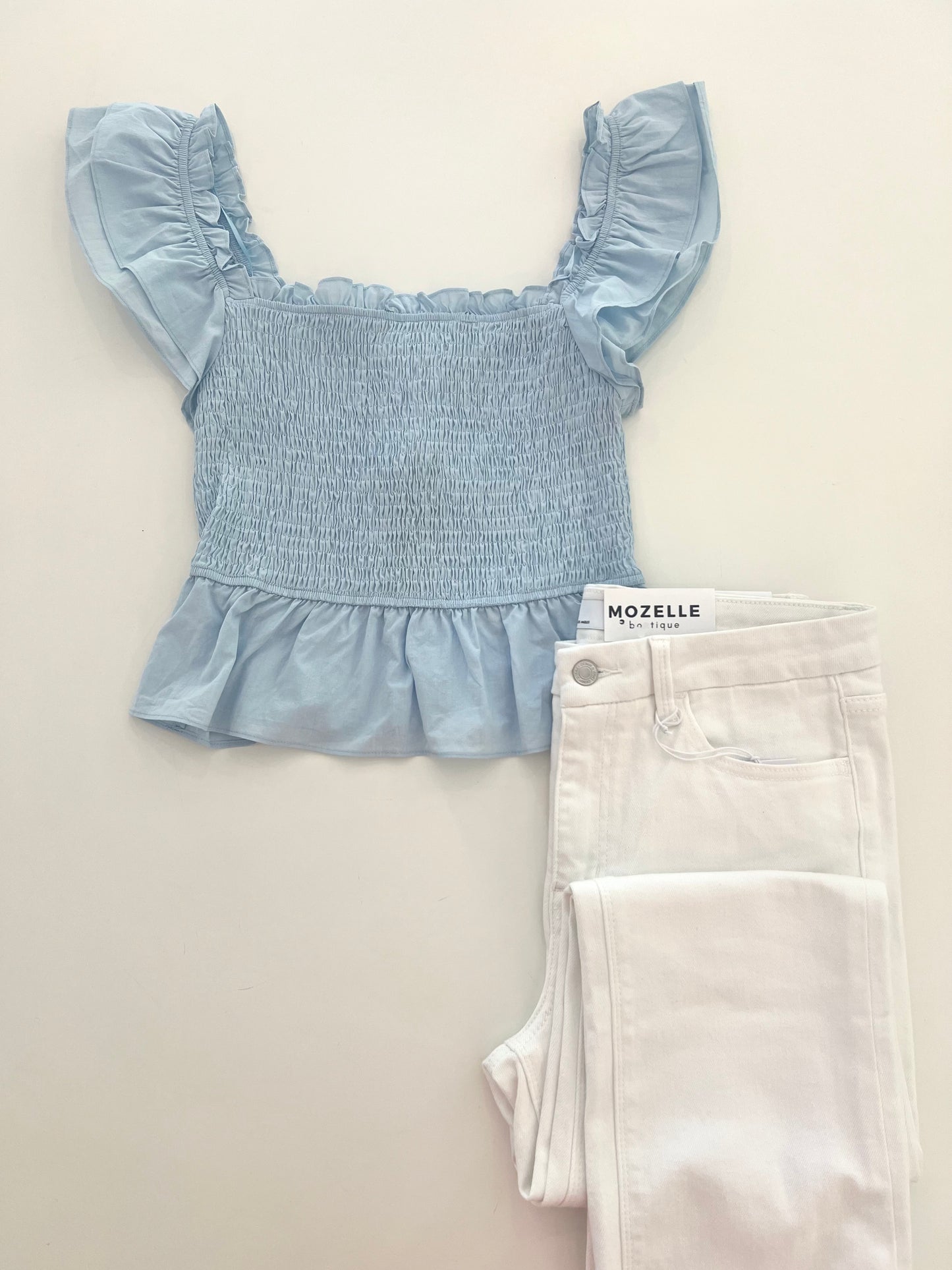 Riley Blue Smocked Ruffle Top